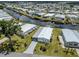 Aerial view of the home located in a waterfront community with convenient water access at 798 Fairmount Dr, North Port, FL 34287