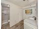 Updated bathroom with stylish vanity, modern fixtures, and walk-in shower at 798 Fairmount Dr, North Port, FL 34287