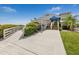Attractive clubhouse featuring accessible ramps, well-kept landscaping, and inviting entryway at 798 Fairmount Dr, North Port, FL 34287