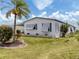Charming single-story home with meticulous landscaping and a lush lawn at 798 Fairmount Dr, North Port, FL 34287