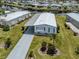 Charming single-story home with a covered carport, well-maintained lawn, and waterway views at 798 Fairmount Dr, North Port, FL 34287