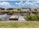 Scenic waterfront view featuring a private dock and access to the canal at 798 Fairmount Dr, North Port, FL 34287