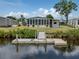 Home features a dock and access to the water in a peaceful waterfront community at 798 Fairmount Dr, North Port, FL 34287