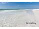 Gorgeous Siesta Key beach with crystal clear water and white sand, perfect for relaxation at 8304 Shooting Star Rd, Sarasota, FL 34241
