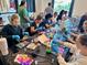 Group art class at the community clubhouse fosters a creative environment at 8304 Shooting Star Rd, Sarasota, FL 34241