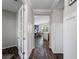 Elegant entryway showcasing beautiful floors and an open view into the dining area, creating a welcoming atmosphere at 8304 Shooting Star Rd, Sarasota, FL 34241