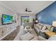 Comfortable living area with stylish furniture, a decorative wall, and an inviting atmosphere for relaxation and entertainment at 8304 Shooting Star Rd, Sarasota, FL 34241