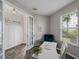 Well-appointed office featuring a stylish desk, comfortable seating, and a view of the outdoors, ideal for work and creativity at 8304 Shooting Star Rd, Sarasota, FL 34241