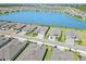Picture of new homes near the lake in a sunny community that is well maintained with green grass at 8529 Saint Kitts Cir, Englewood, FL 34224