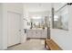 Bright bathroom boasting double vanities, neutral colors, and a spacious walk-in shower at 8529 Saint Kitts Cir, Englewood, FL 34224