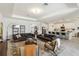 Spacious living room and kitchen with modern décor and an open floor plan for easy entertaining at 8529 Saint Kitts Cir, Englewood, FL 34224
