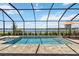 A relaxing pool and hot tub offer a tranquil experience with a view at 8529 Saint Kitts Cir, Englewood, FL 34224