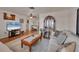 Comfortable living room showcasing a decorative cabinet, plush sofa, and stylish accents at 8701 Pickwick Rd, North Port, FL 34287