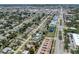 An aerial view of the home's location in a residential neighborhood near a main street and the ocean at 929 Cypress Ave, Venice, FL 34285