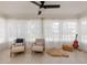 Bright sun room with tile floors, large windows, and comfortable seating for relaxation and enjoyment at 929 Cypress Ave, Venice, FL 34285
