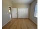 Bedroom with wood flooring and plenty of closet space at 98 Maltby St, Port Charlotte, FL 33953