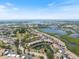 Gorgeous aerial view of the condo buildings in a scenic location near lakes and beaches at 1156 Bird Bay Way # 104, Venice, FL 34285