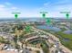Aerial view of 1156 Bird Bay Way in a waterfront community with a pool, near beaches, and Legacy Trail at 1156 Bird Bay Way # 104, Venice, FL 34285