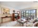 Cozy living room with access to a screened lanai at 1156 Bird Bay Way # 104, Venice, FL 34285