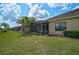 Expansive backyard with a screened lanai, providing a private outdoor living space at 11648 Okaloosa Dr, Venice, FL 34293