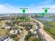 Aerial of condo community near Venice Beach, North Jetty, Legacy Trail, and waterfront views at 1190 Bird Bay Way # 309, Venice, FL 34285