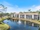Beautiful waterfront condo complex features a lake with fountain and screened lanais at 1190 Bird Bay Way # 309, Venice, FL 34285