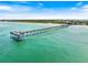 Scenic view of the pier extending into the turquoise water, perfect for fishing and enjoying the ocean breeze at 1190 Bird Bay Way # 309, Venice, FL 34285