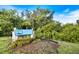Beautifully landscaped community entrance with a 