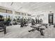 Bright fitness center equipped with treadmills, weight machines, and expansive windows at 12450 Somatic Ct, Venice, FL 34293