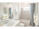 Clean bathroom with tub and shower featuring a stylish vanity at 12548 Wellen Golf St, Venice, FL 34293