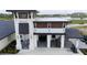 A building with a golf pro shop, covered parking for golf carts and an outdoor patio area for customers to socialize at 12548 Wellen Golf St, Venice, FL 34293