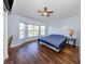 Spacious main bedroom with a large bay window offering scenic waterfront views at 13314 Prentice Ave, Port Charlotte, FL 33953