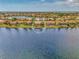 This home offers a peaceful lake view and private backyard at 138 Rimini Way, North Venice, FL 34275