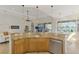 Spacious kitchen with granite counters, stainless dishwasher, and plenty of storage space for the home chef at 138 Rimini Way, North Venice, FL 34275