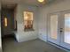 Covered porch with windows and doors for outdoor living at 1483 Prairie Ter, North Port, FL 34286