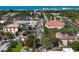 Detailed aerial shot of cityscape featuring buildings, roads, and vegetation at 1833 Raintree Ln, Venice, FL 34293