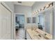 Bathroom featuring double sinks and ensuite at 1892 San Silvestro Dr, Venice, FL 34285