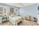 Comfortable bedroom with shutters, side table, and neutral paint at 1892 San Silvestro Dr, Venice, FL 34285