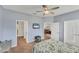 Comfortable bedroom with multiple entries and ceiling fan at 1892 San Silvestro Dr, Venice, FL 34285