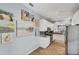 Bright kitchen featuring granite counters and stainless appliances at 1892 San Silvestro Dr, Venice, FL 34285