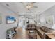Inviting living room with tile floors, stylish furnishings, and an open layout perfect for modern living at 1892 San Silvestro Dr, Venice, FL 34285