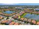 Beautiful home in an attractive community with water views and lush green landscaping at 19337 Cruise Dr, Venice, FL 34292