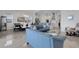 Open living space featuring the dining room, living room, and kitchen with modern finishes and bright lighting at 19337 Cruise Dr, Venice, FL 34292