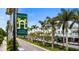 Welcome to Historic Venice sign on a street with palm trees and shops at 19337 Cruise Dr, Venice, FL 34292