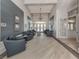 Inviting lobby with comfortable seating, elegant lighting, and stylish decor with tiled floors at 20660 Ovid Ln, Venice, FL 34293