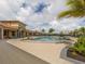 Picturesque pool area showcasing lush landscaping and creating a tranquil atmosphere for residents at 20660 Ovid Ln, Venice, FL 34293