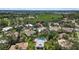 Community aerial view with serene ponds and lush landscaping surrounding the well-maintained homes at 2092 Timucua Trl, Nokomis, FL 34275