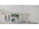 This eat in kitchen with light white counter tops boasts a modern and sleek design at 2092 Timucua Trl, Nokomis, FL 34275