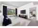 Comfortable living room with stylish furniture, view to patio, and serene atmosphere at 2092 Timucua Trl, Nokomis, FL 34275
