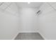 Empty walk-in closet with shelves ready for storage at 2092 Timucua Trl, Nokomis, FL 34275